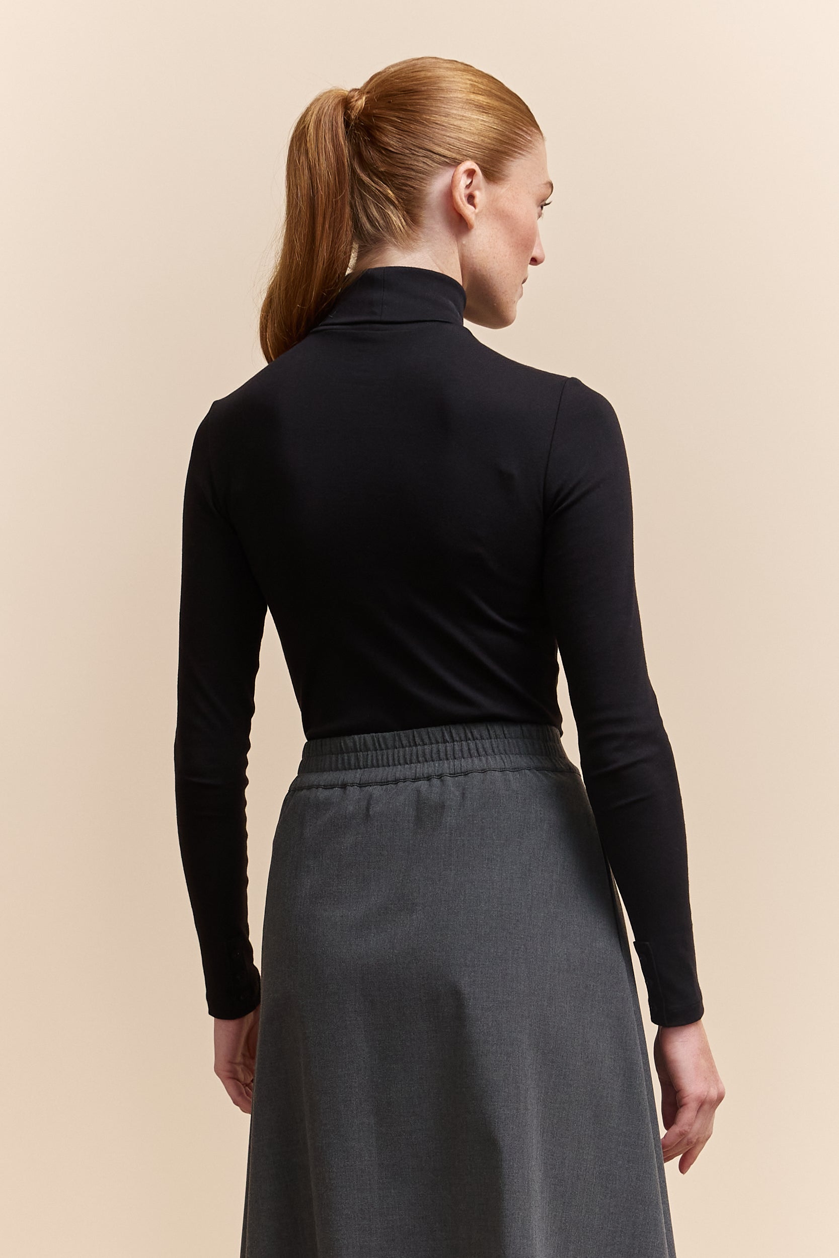 Col roulé extensible