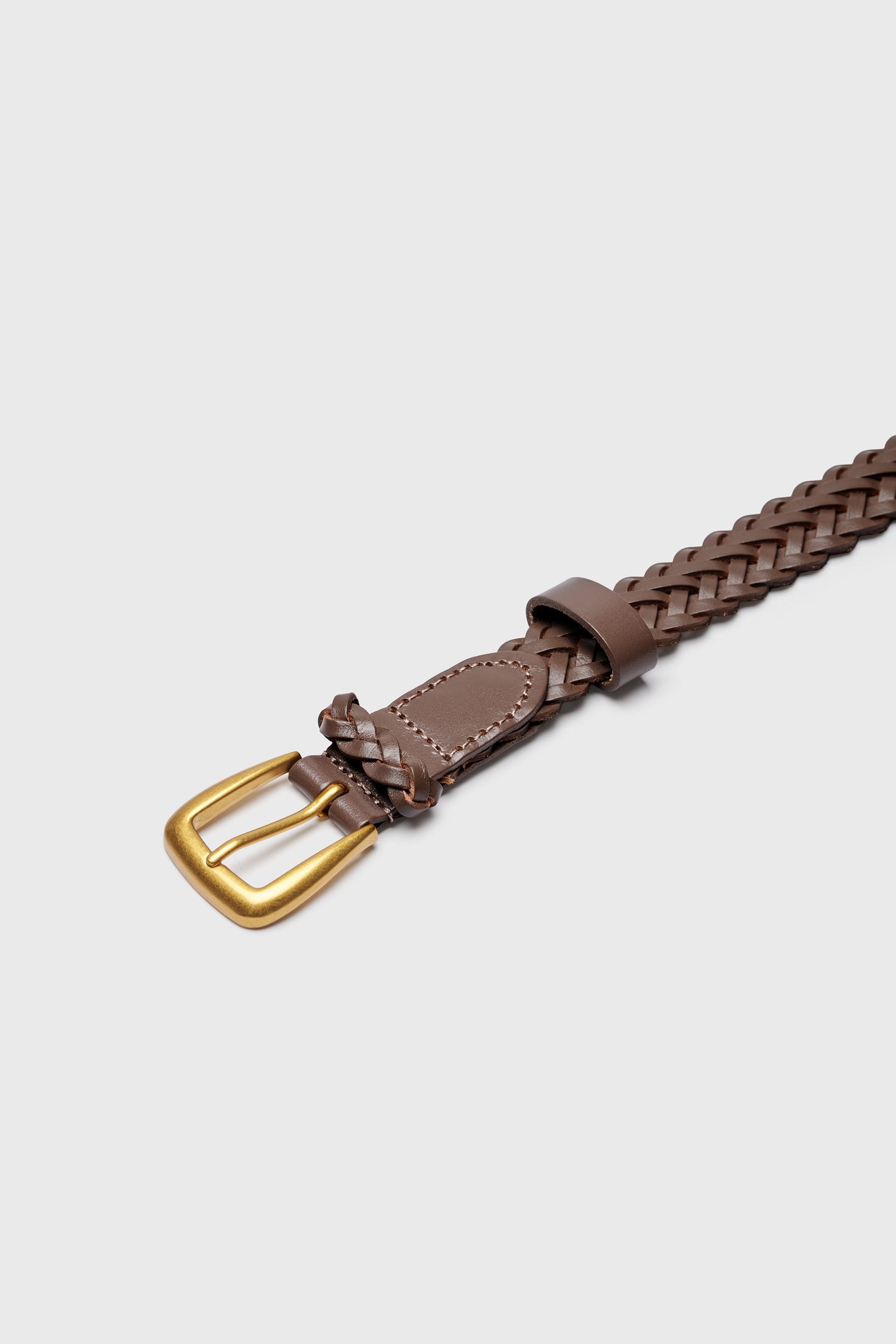 Braided belt with gold buckle