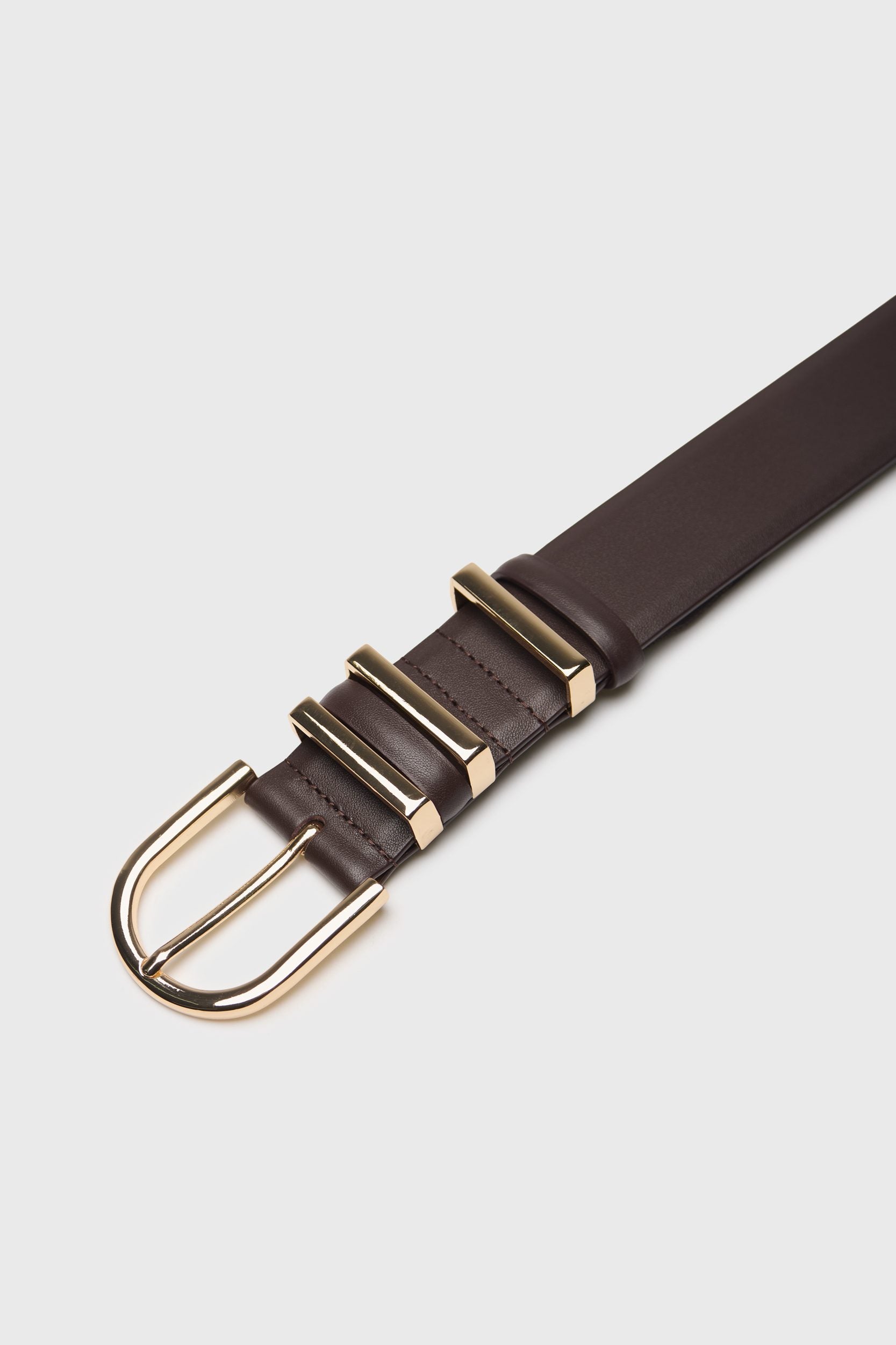 Belt with gold buckle