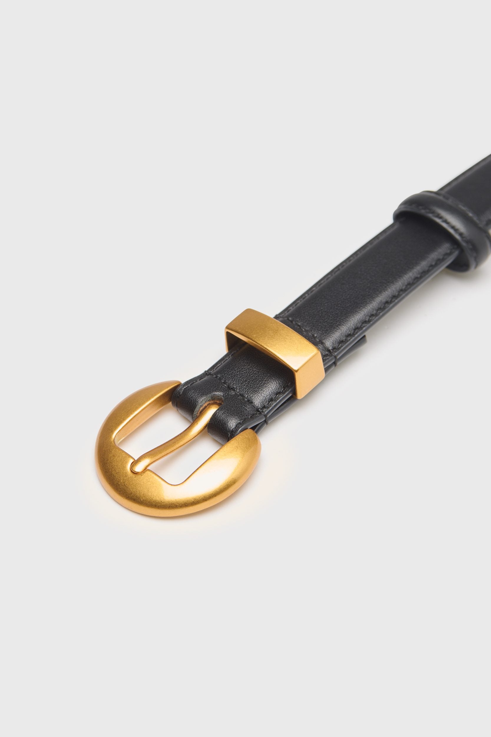 Belt with gold buckle