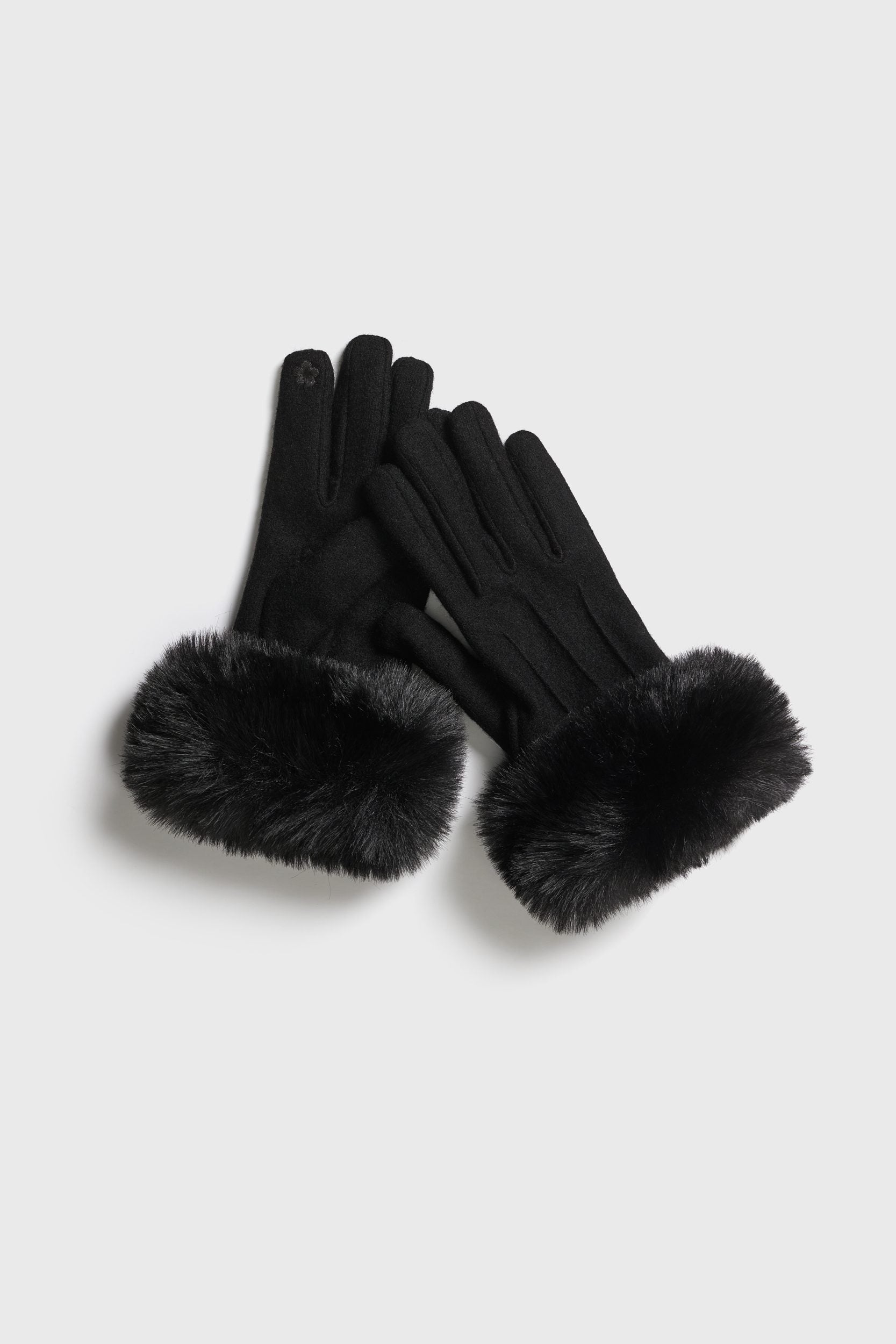 Gants tricotés avec fourrure