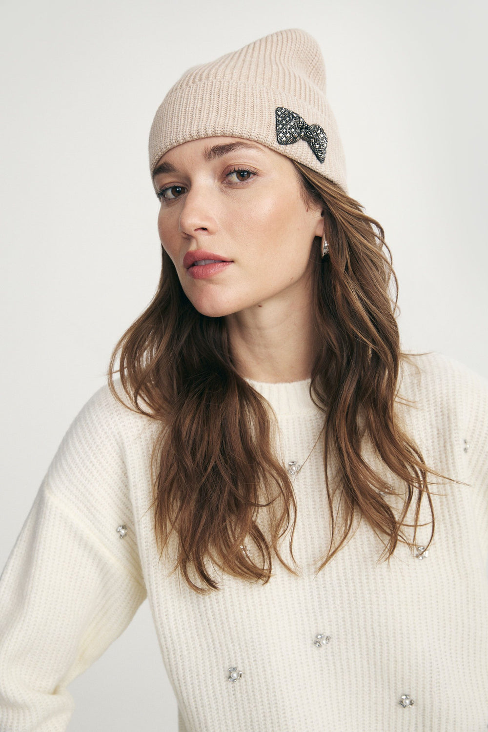 Beanie with decorative bow