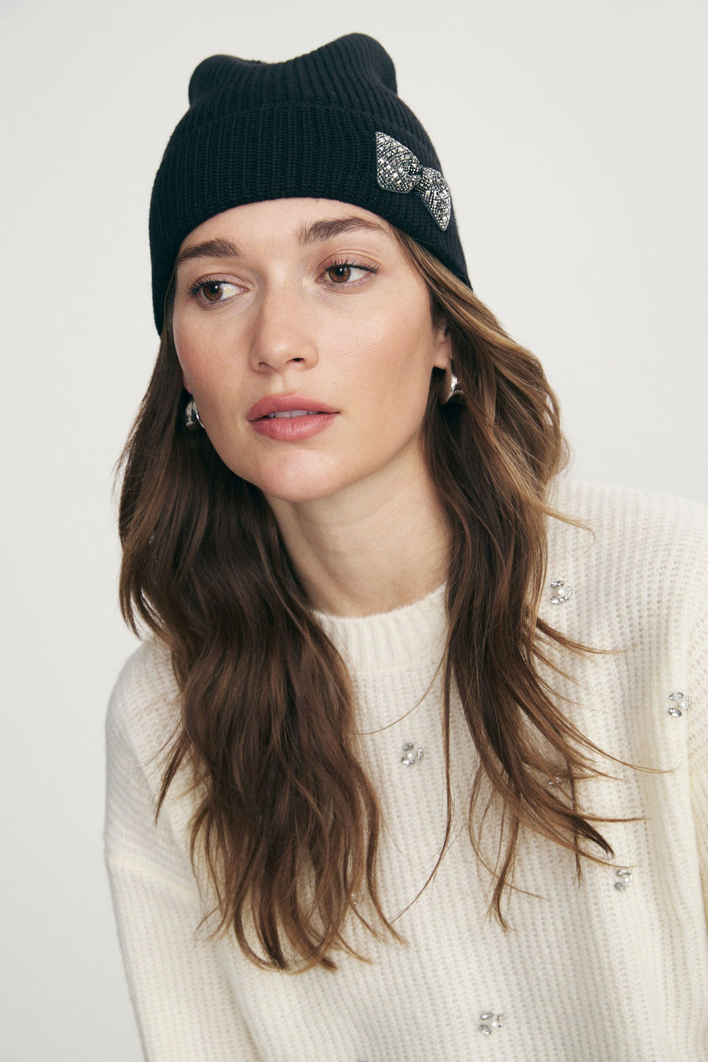 Beanie with decorative bow