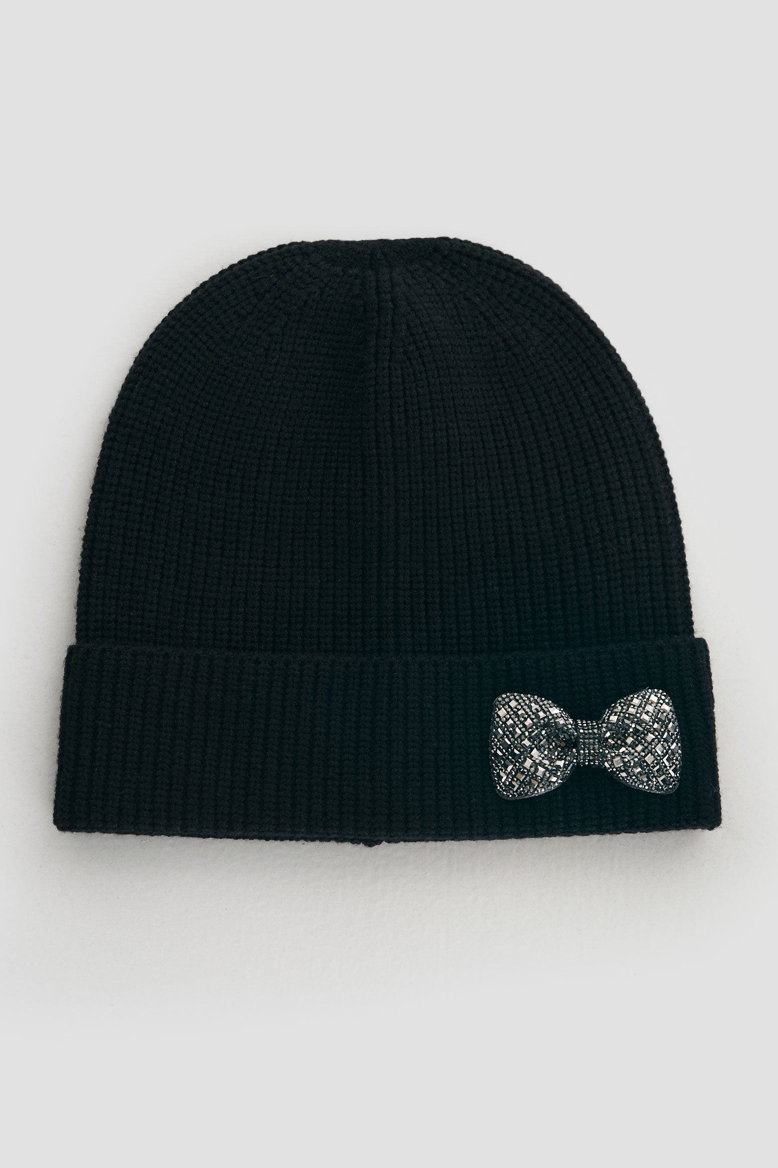 Beanie with decorative bow
