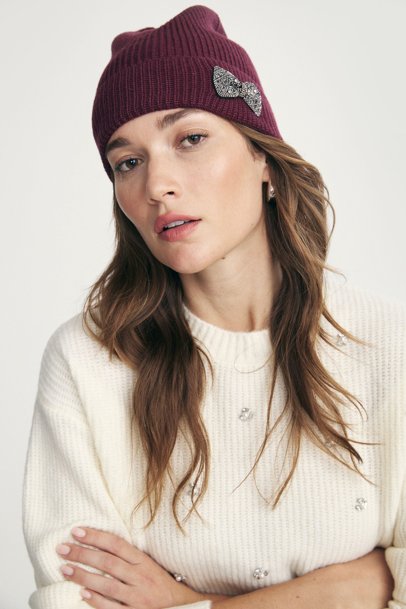 Beanie with decorative bow