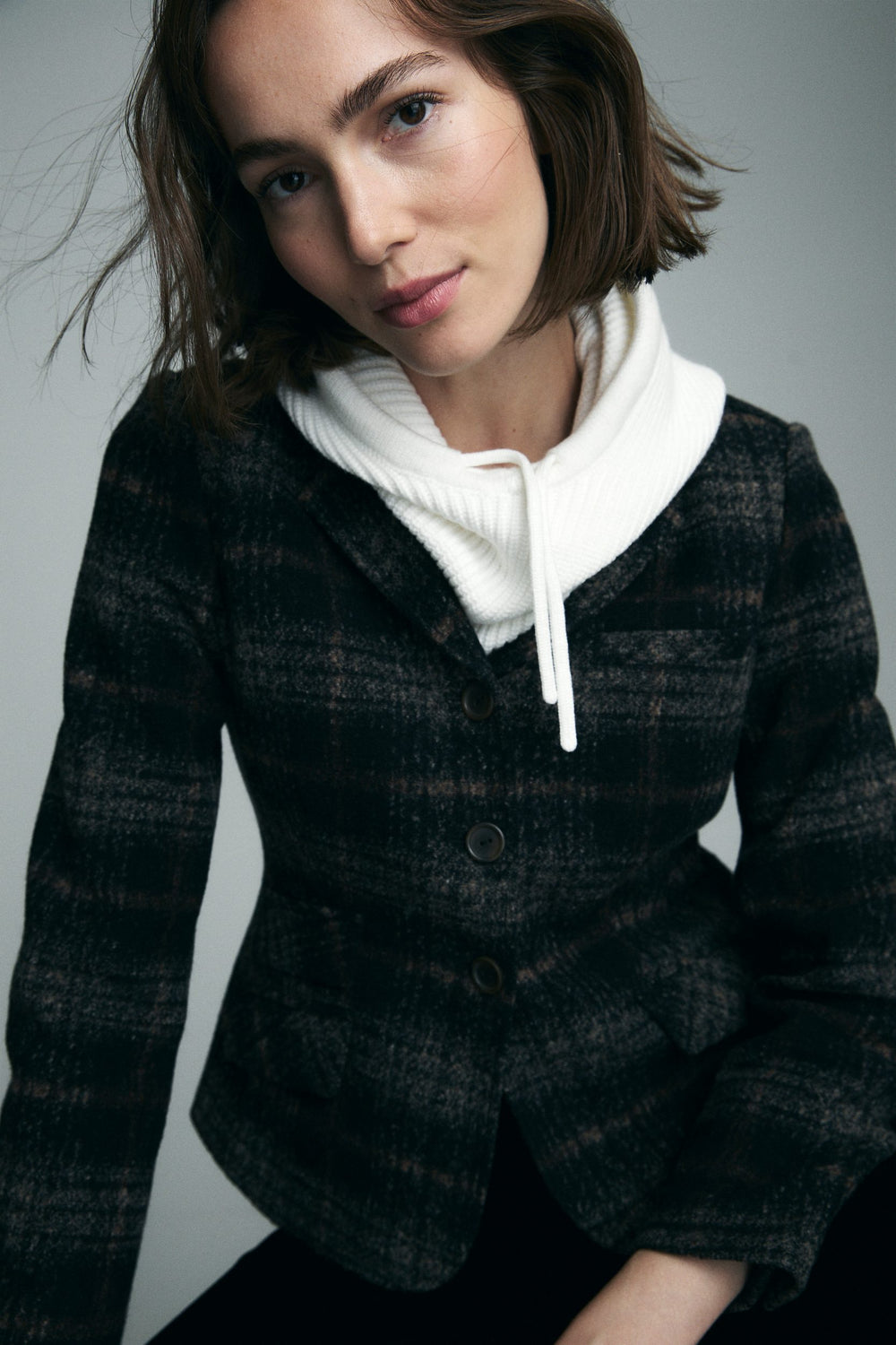 Knitted hooded bib
