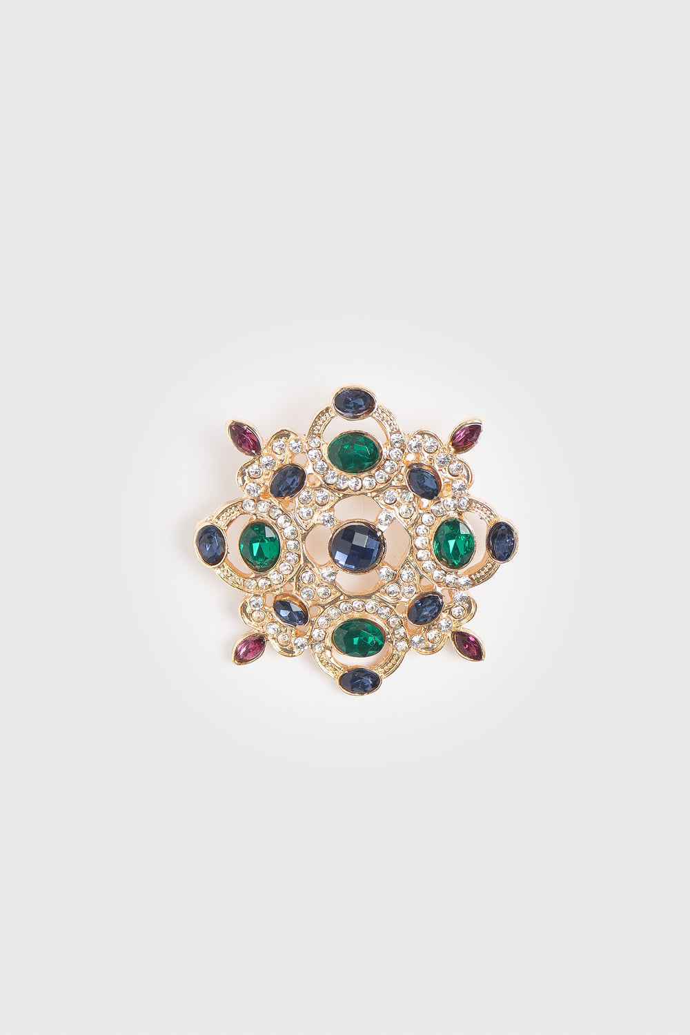 Brooch with colored stones