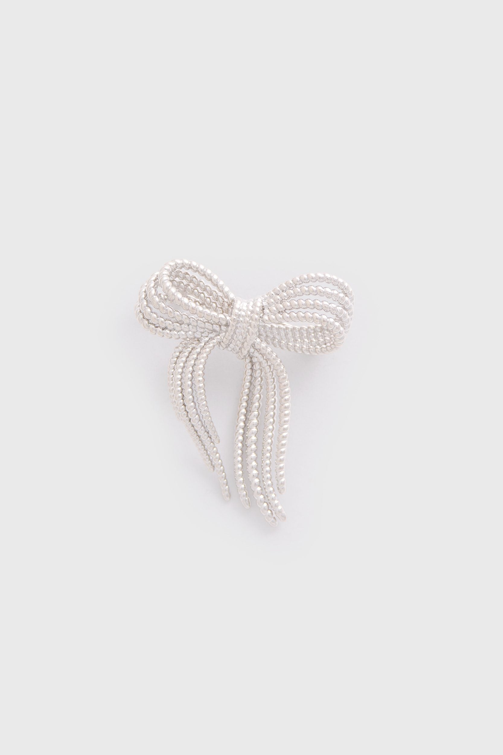 Bow shaped broche