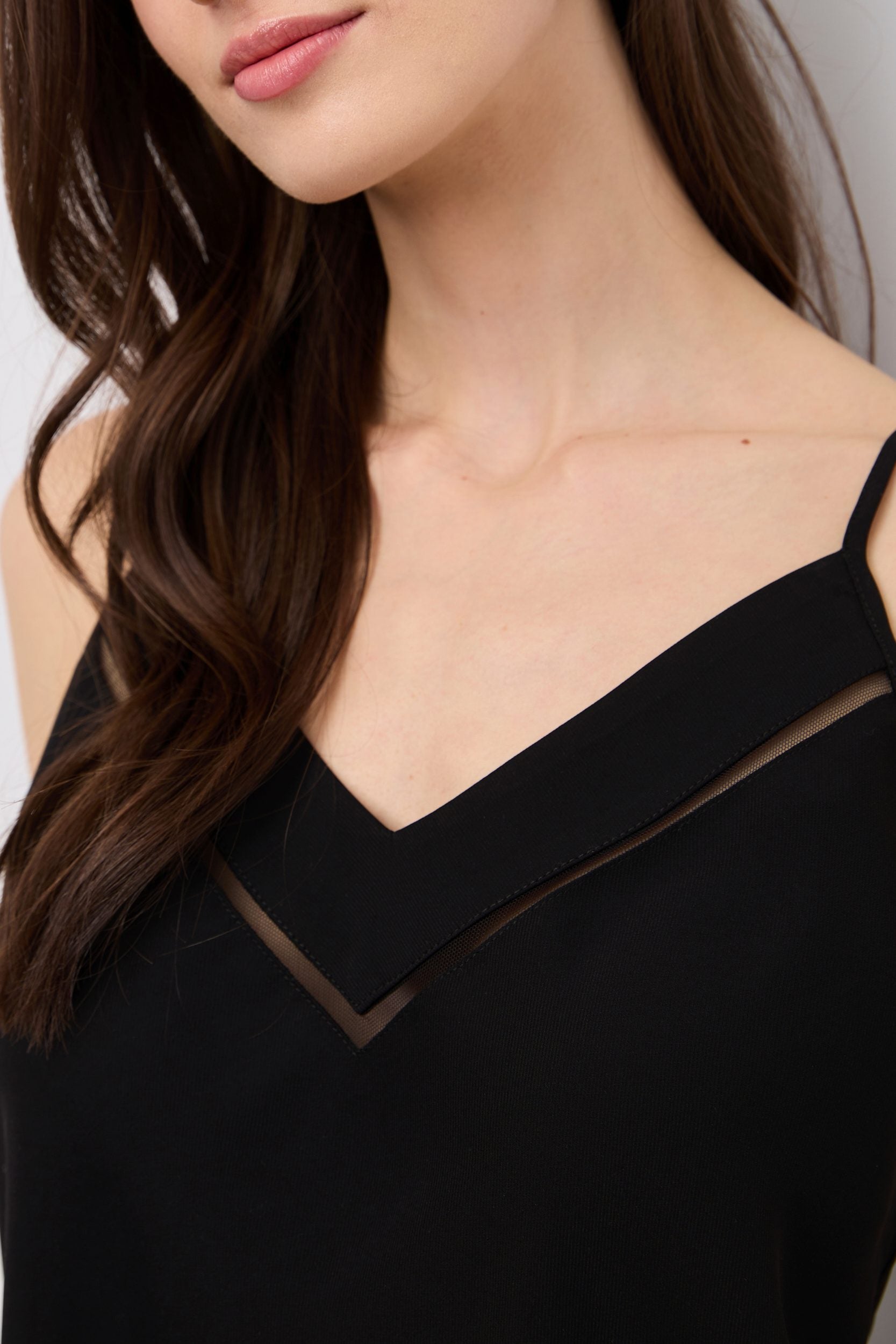 Sleeveless top with ribbon detail