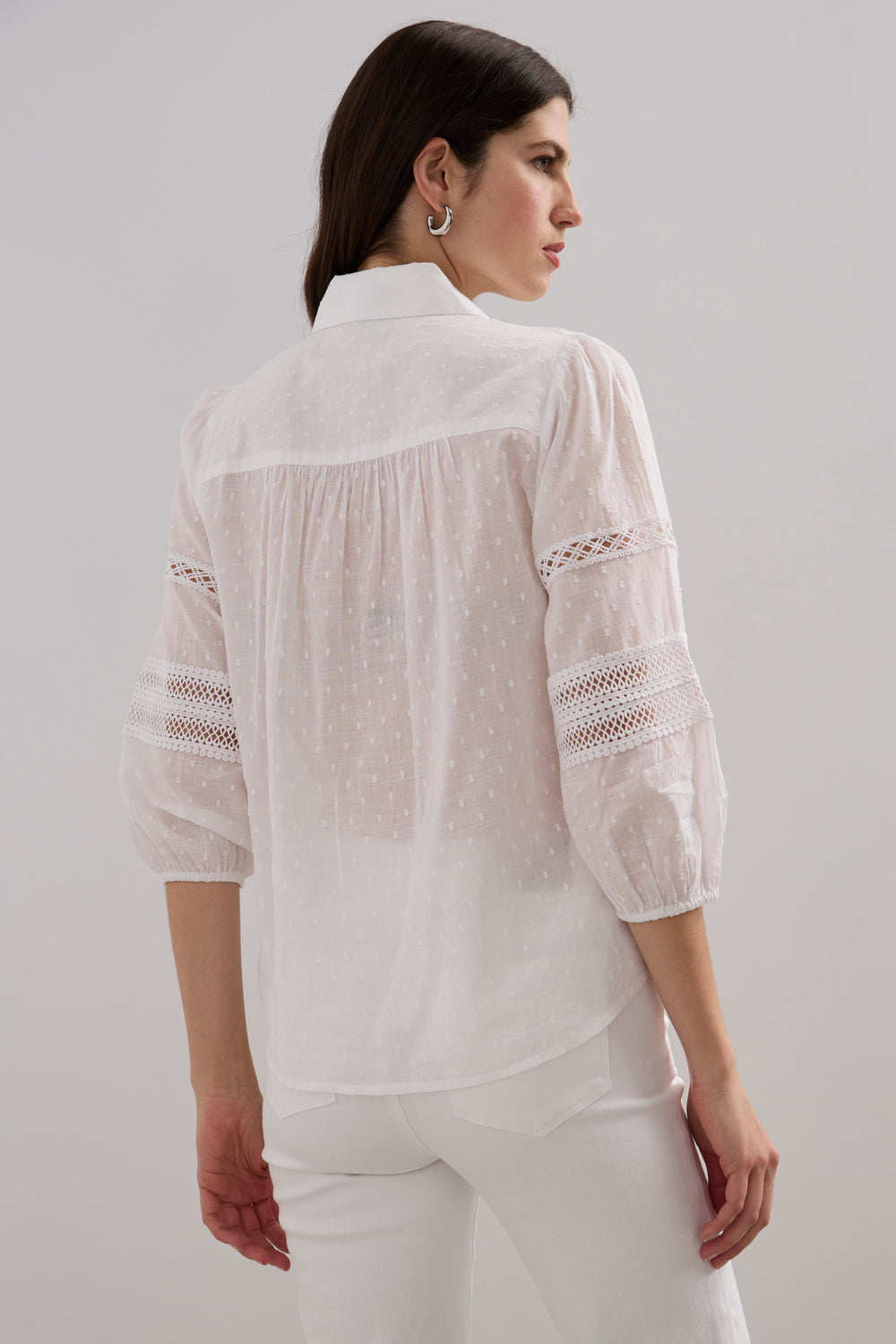 Blouse à manches bouffantes avec dentelle