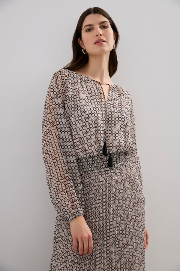 Blouse with fitted waistband