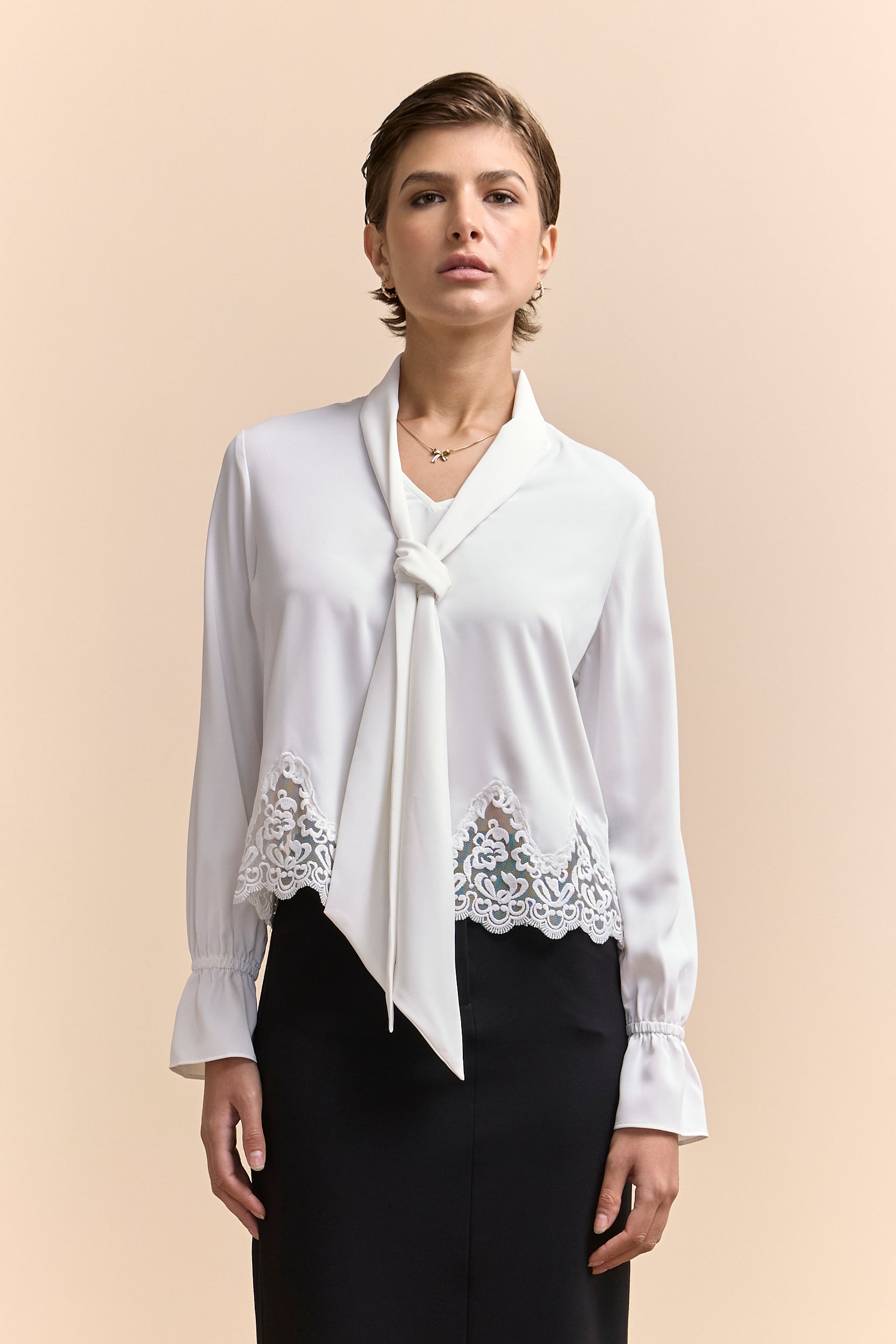 Cropped blouse with lace hem