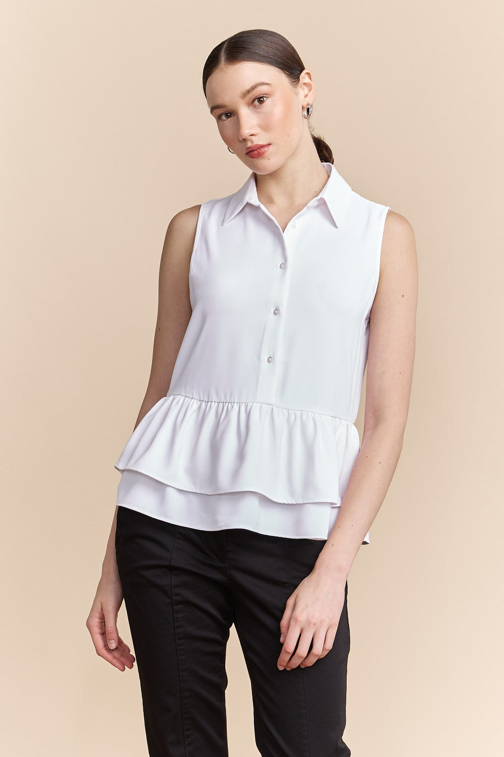 Sleeveless blouse with frills