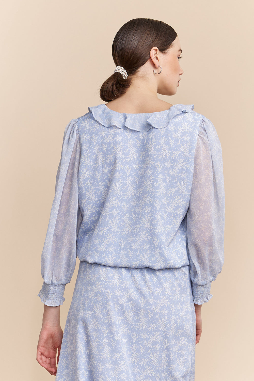 Blouse à volants avec imprimé floral