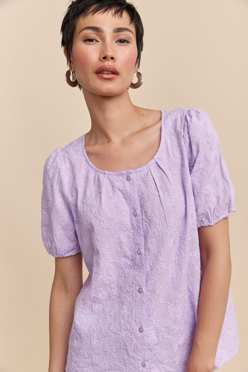 Blouse à manches bouffantes en broderie