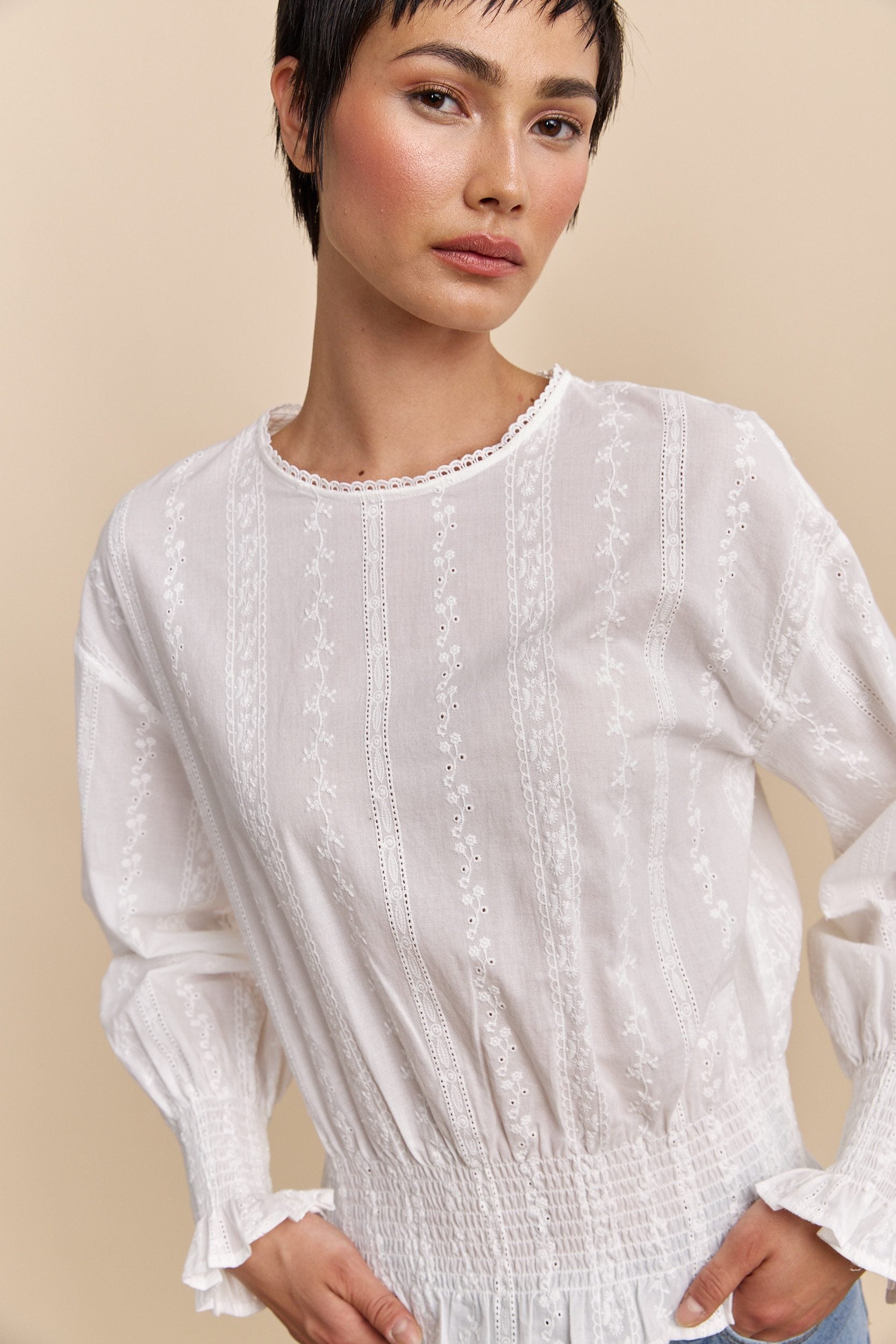 Embroidered blouse with ruching
