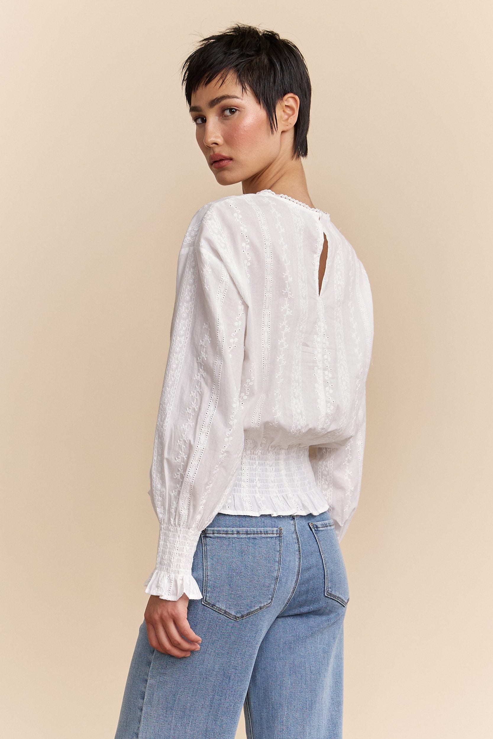 Embroidered blouse with ruching