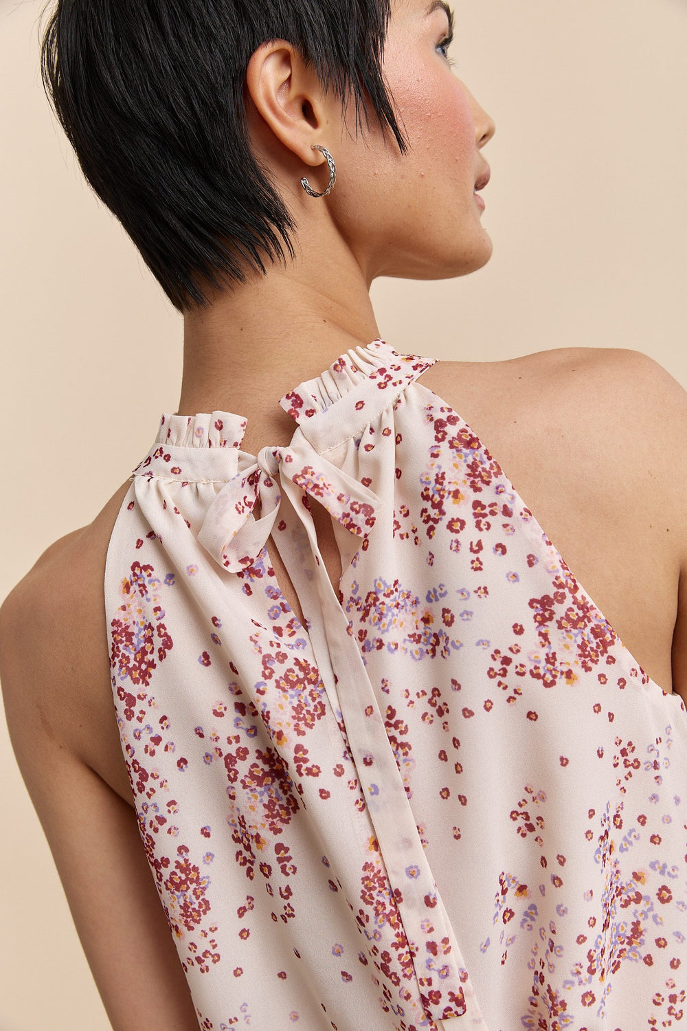 Floral printed halter top tied at back