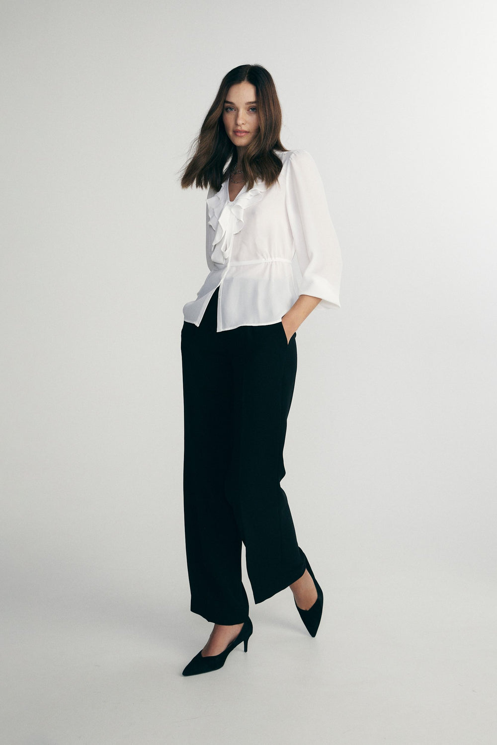Blouse avec boucle et volants