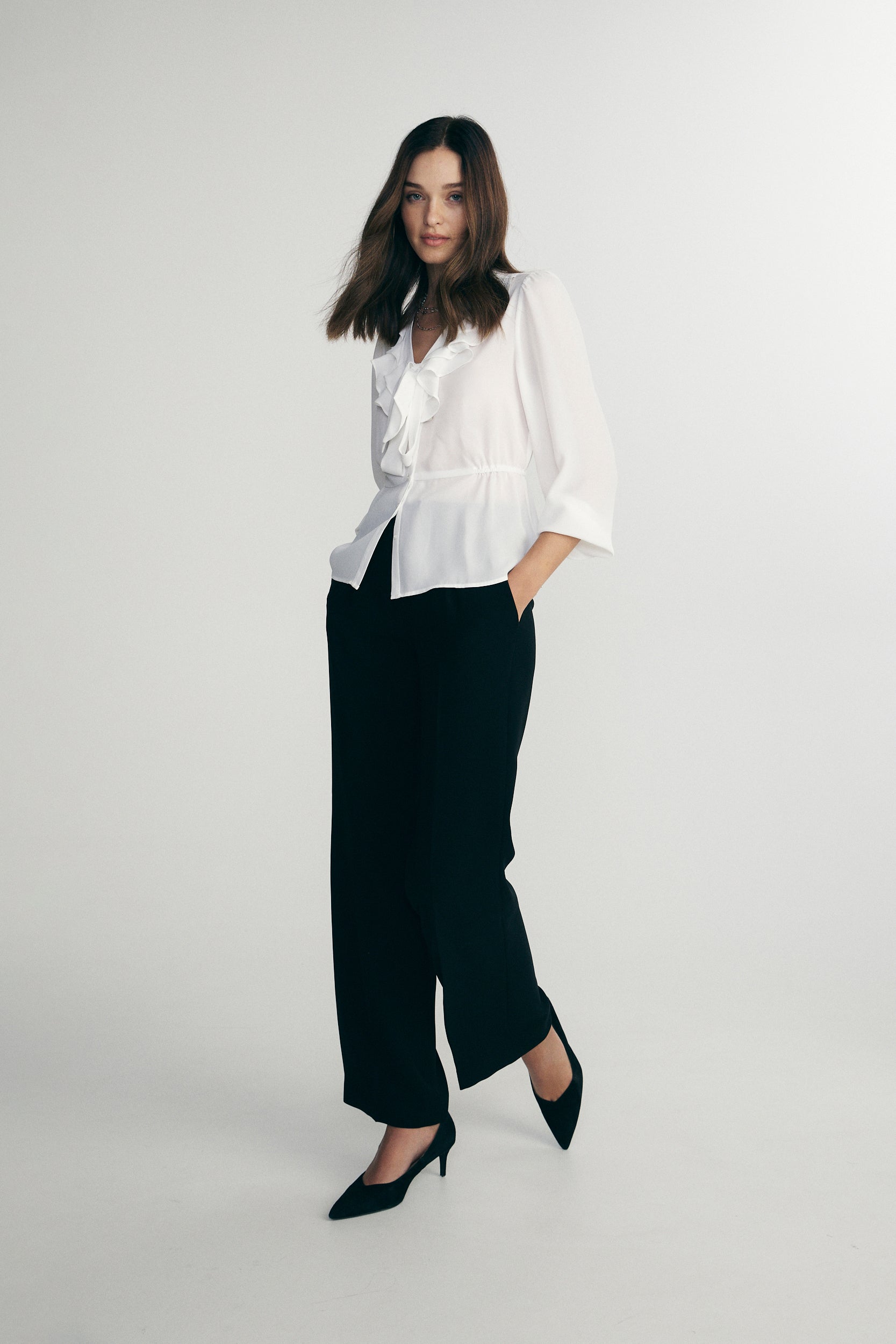 Blouse avec boucle et volants