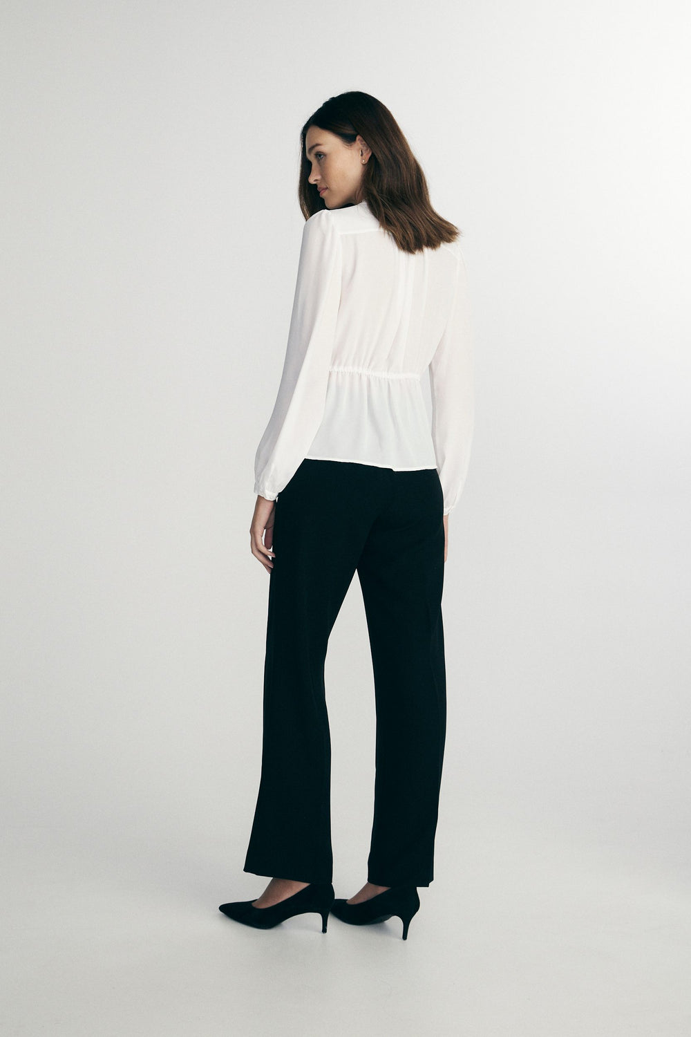 Blouse avec boucle et volants