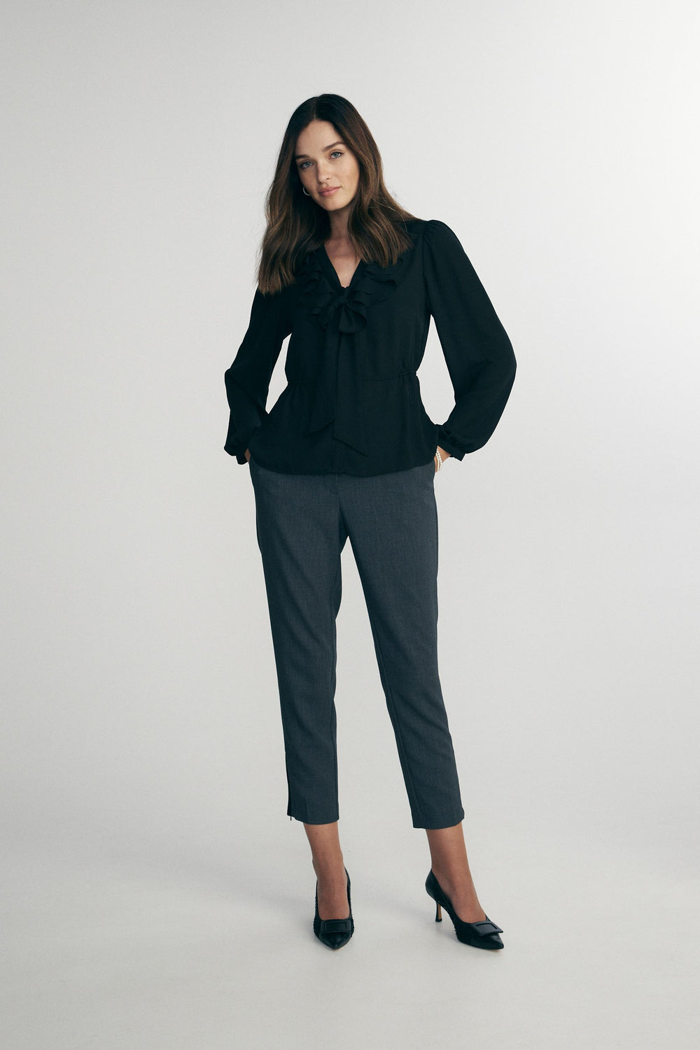 Blouse avec boucle et volants