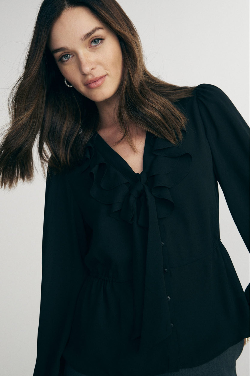 Blouse avec boucle et volants