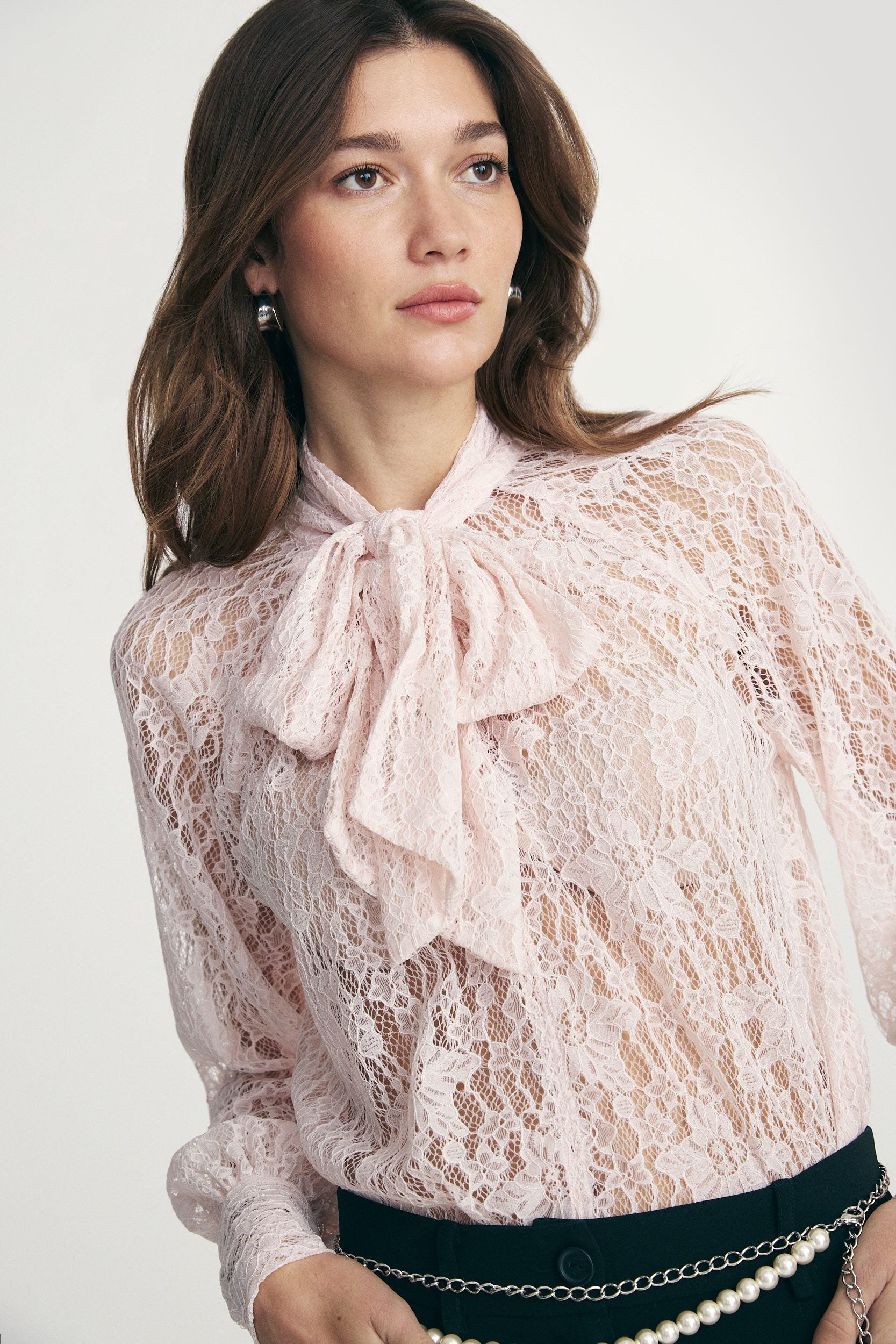 Lace blouse with bow tie neck