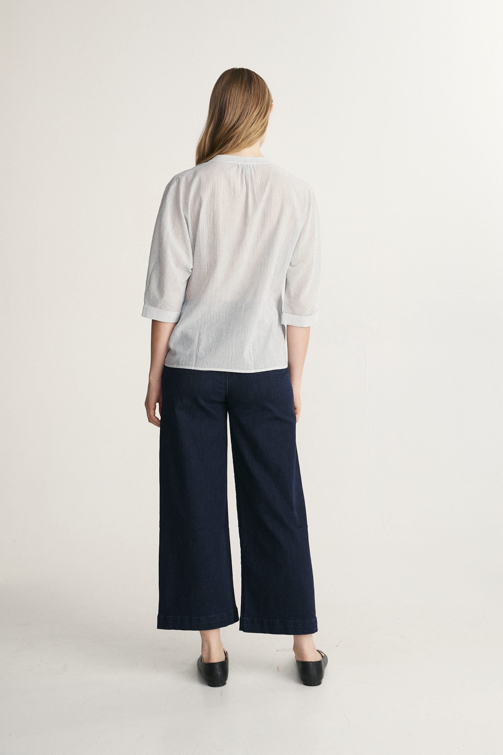Sleeve dolman top with pleats at front