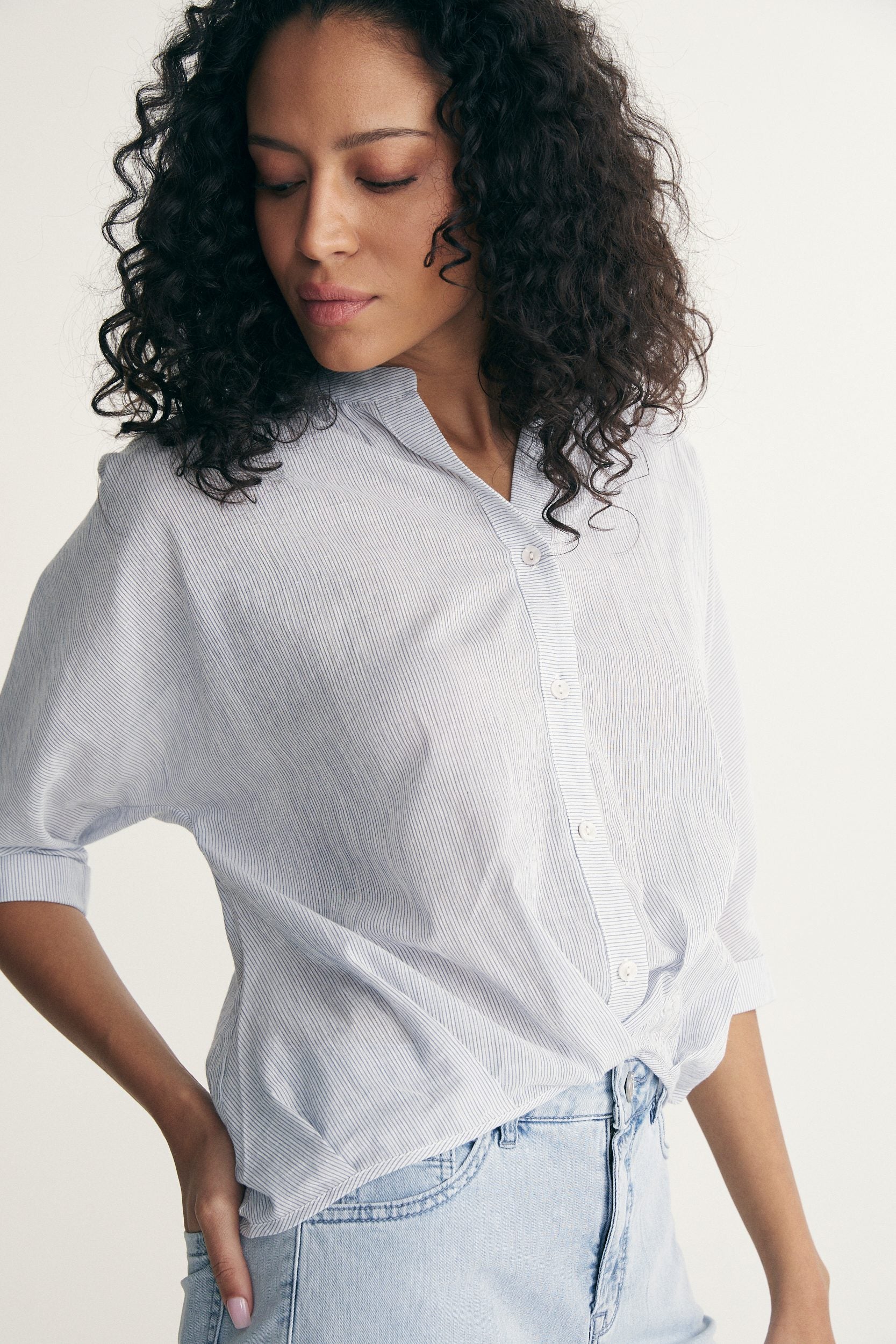 Sleeve dolman top with pleats at front