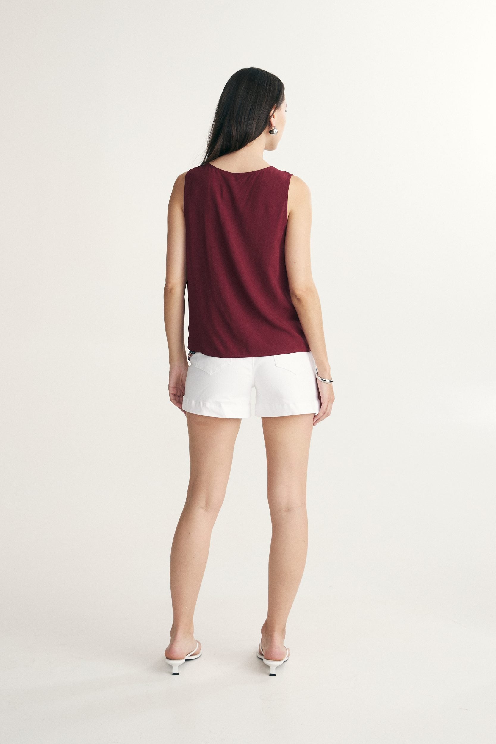 Sleeveless top with bows