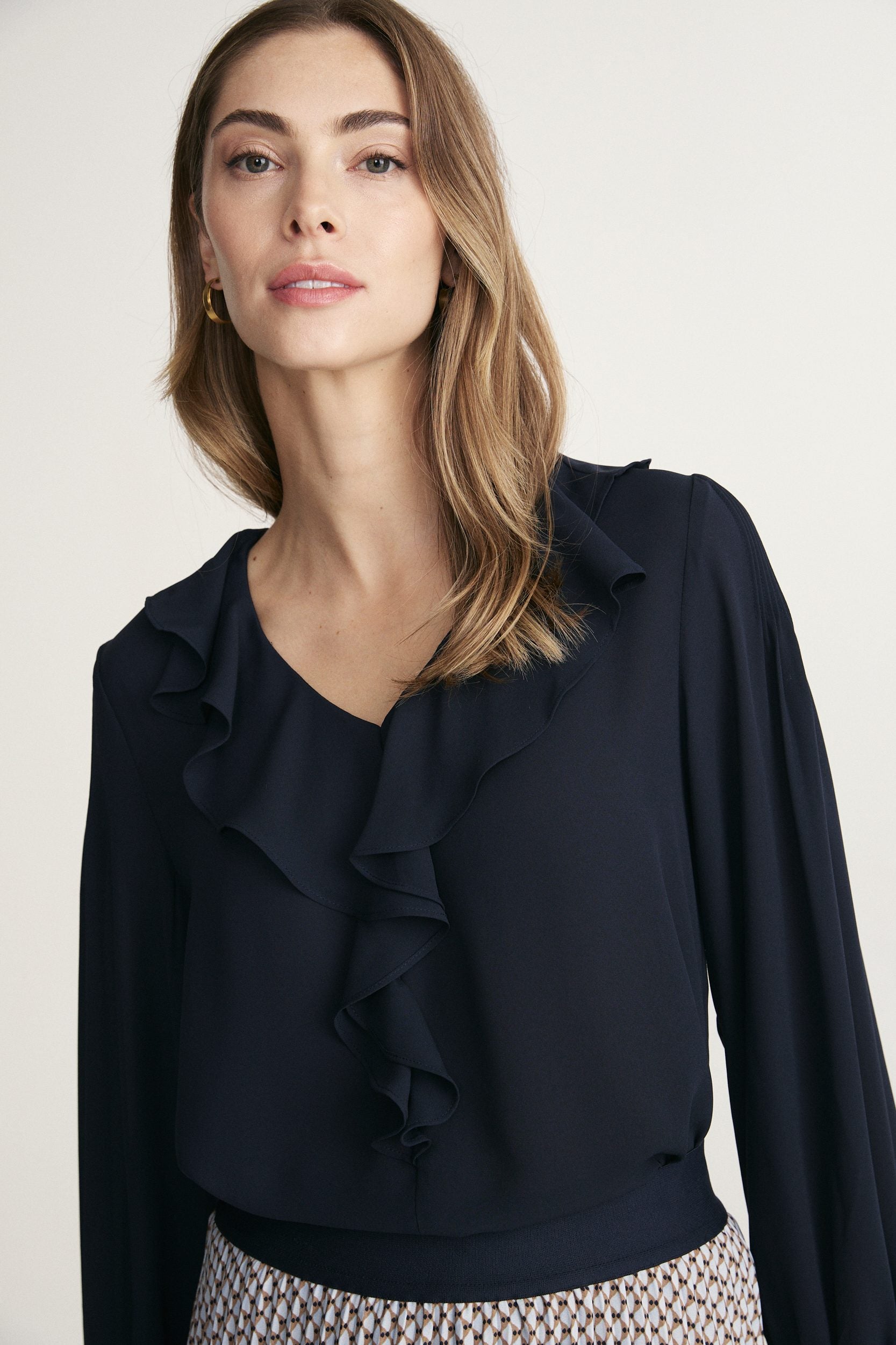 Smocked ruffle blouse