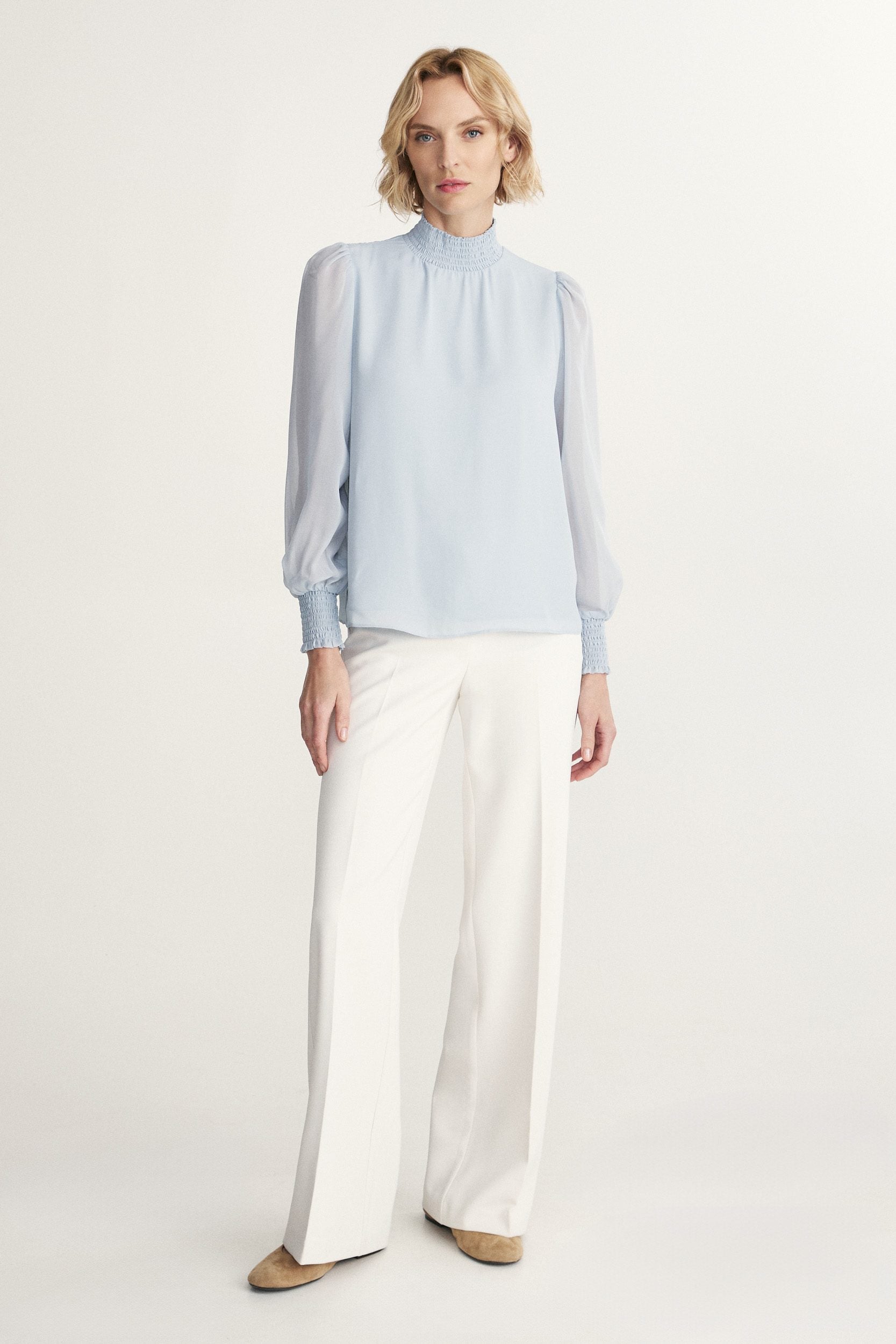 Blouse fluide avec nid d'abeille