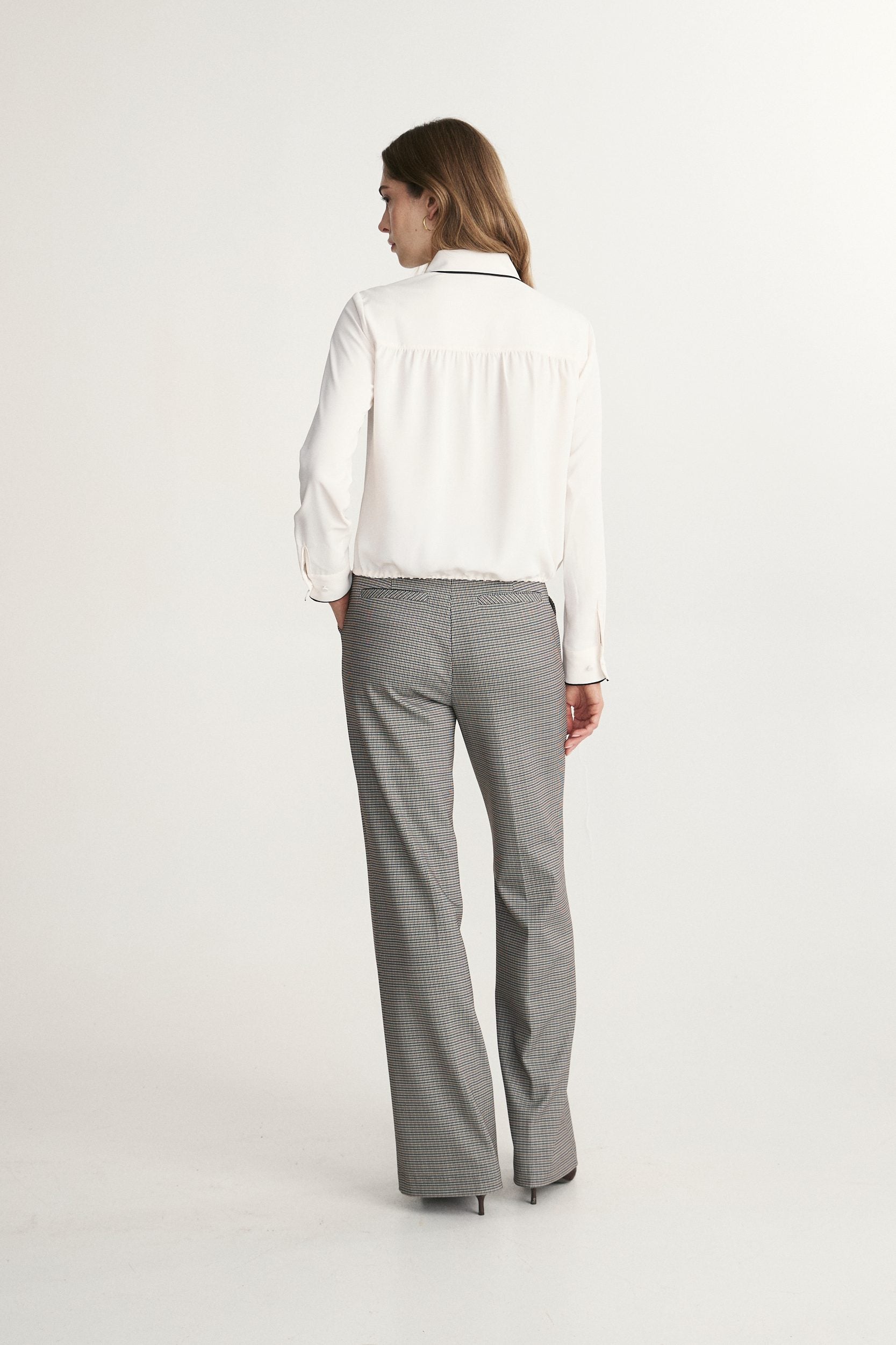 Fluid blouse with contrast detail