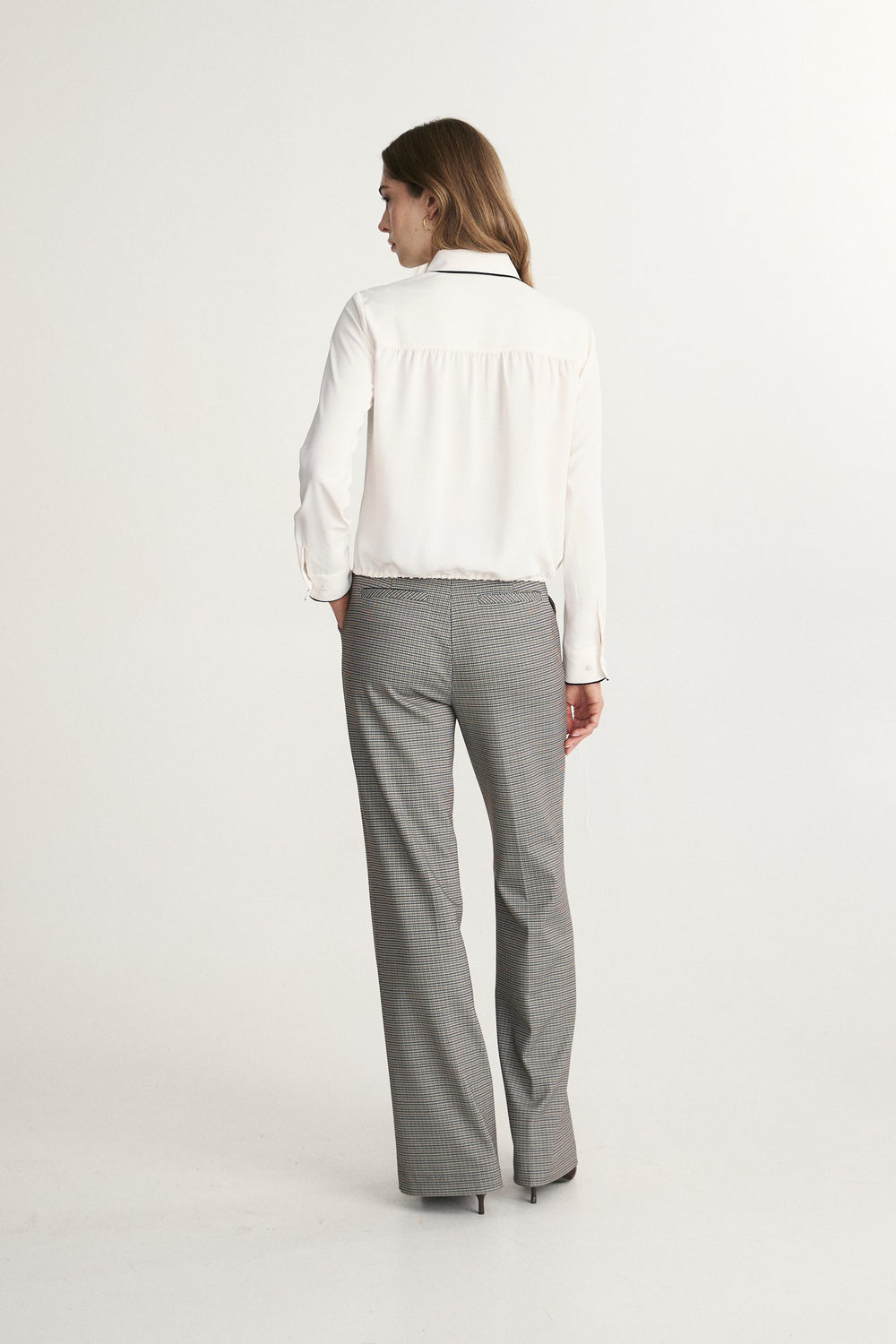 Fluid blouse with contrast detail