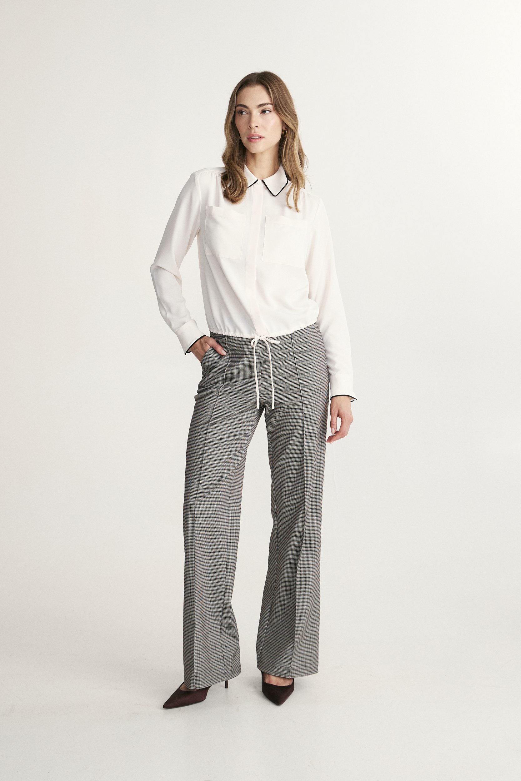 Fluid blouse with contrast detail