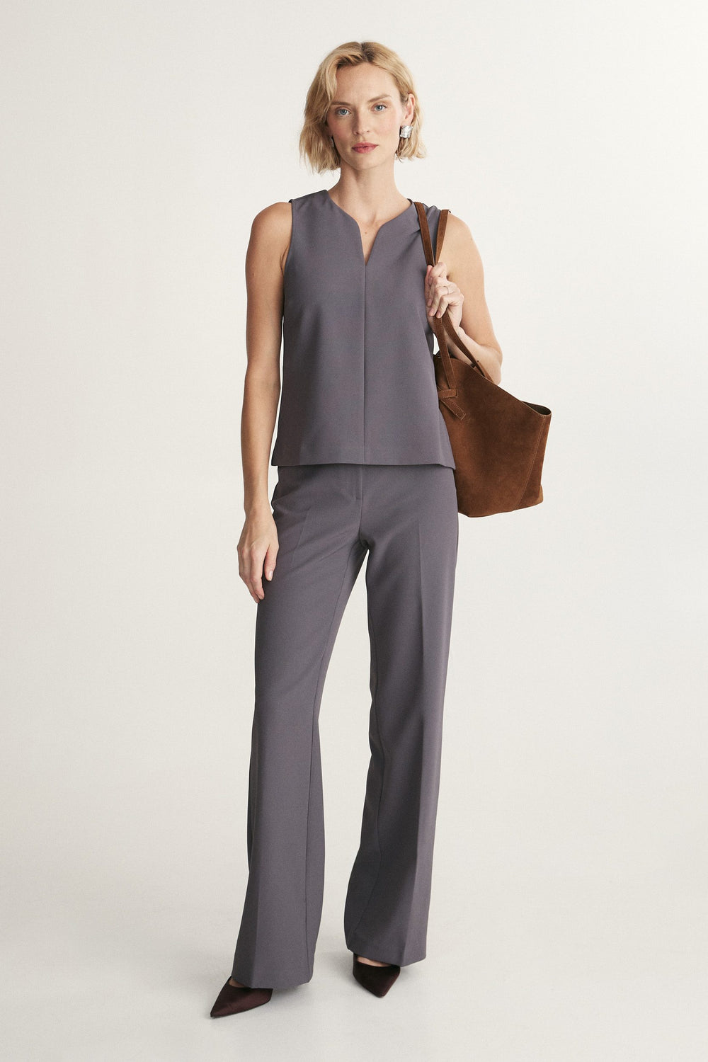 High V neck sleeveless blouse