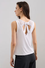 Sleeveless top with back bow and lace details