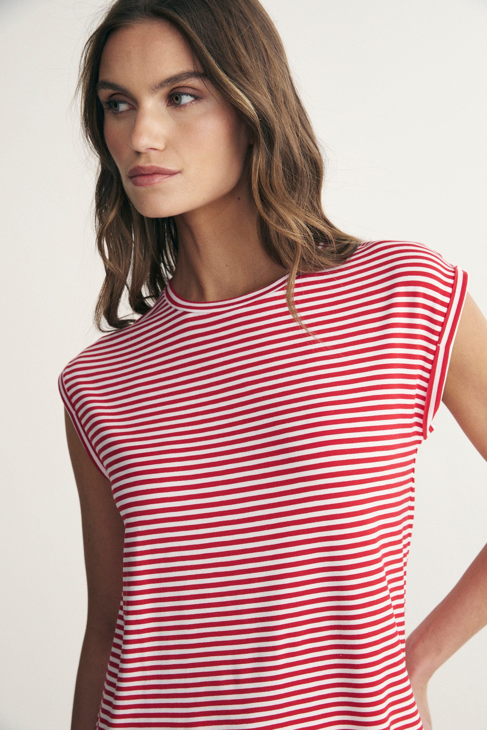 Rolled sleeve striped top