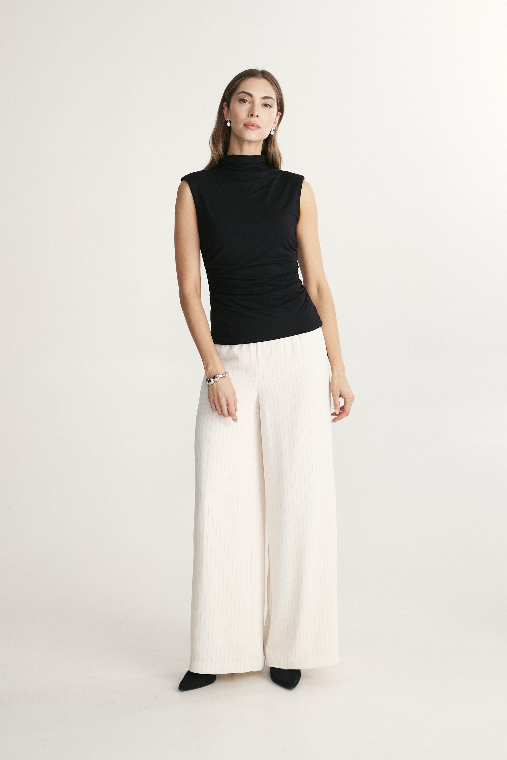 Fitted mock neck jersey top