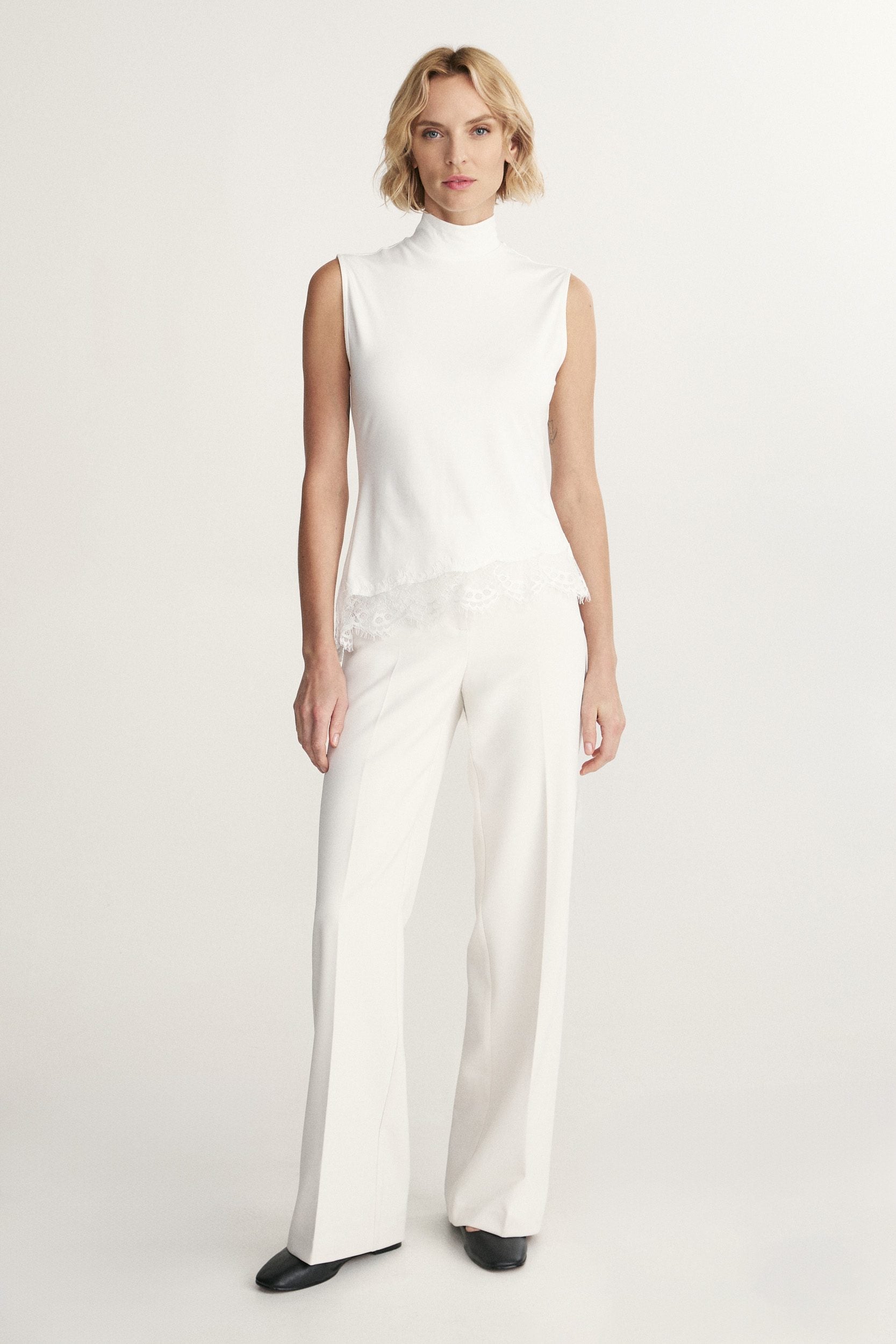 Mock neck top with lace at bottom