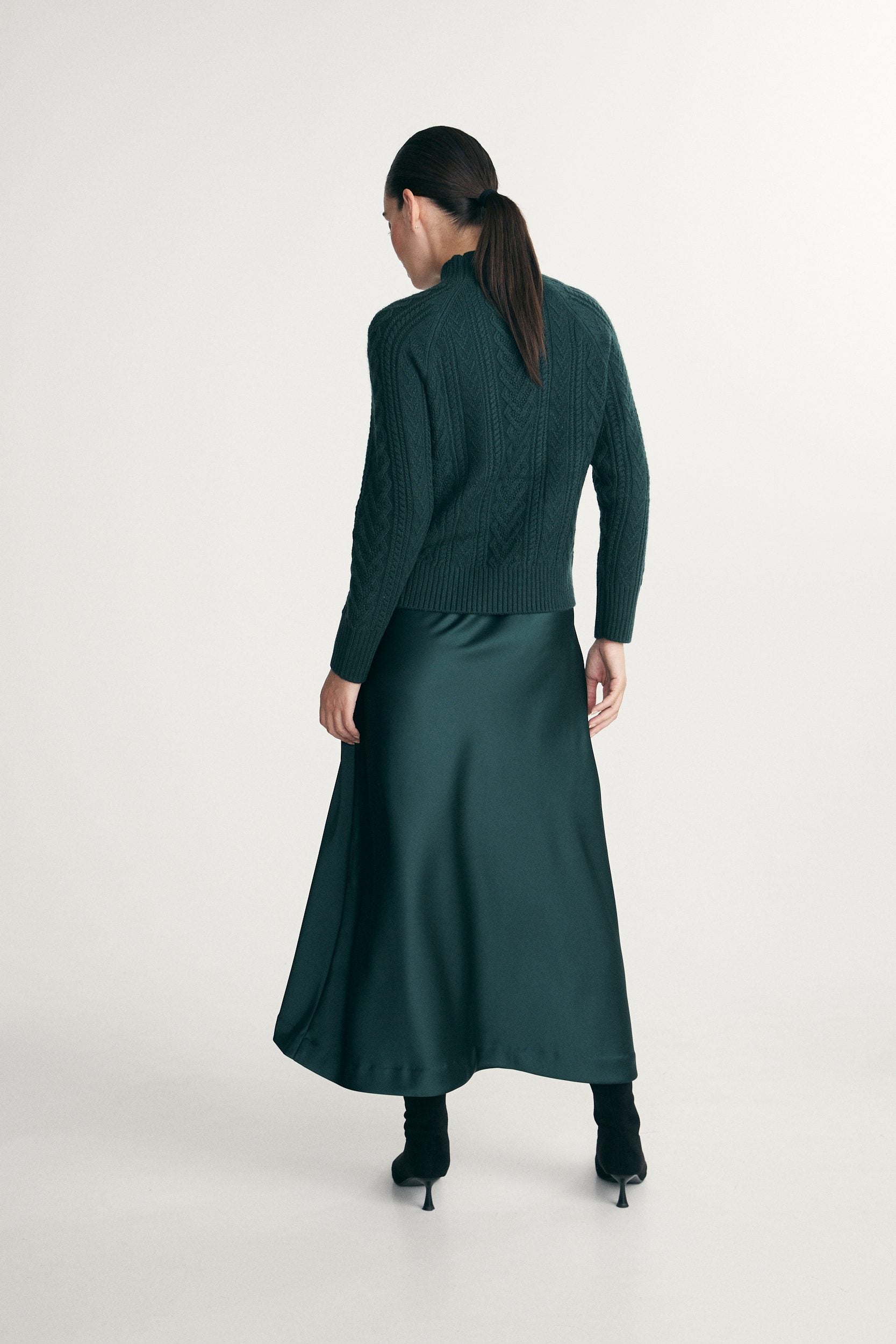 Mock neck cable knit sweater