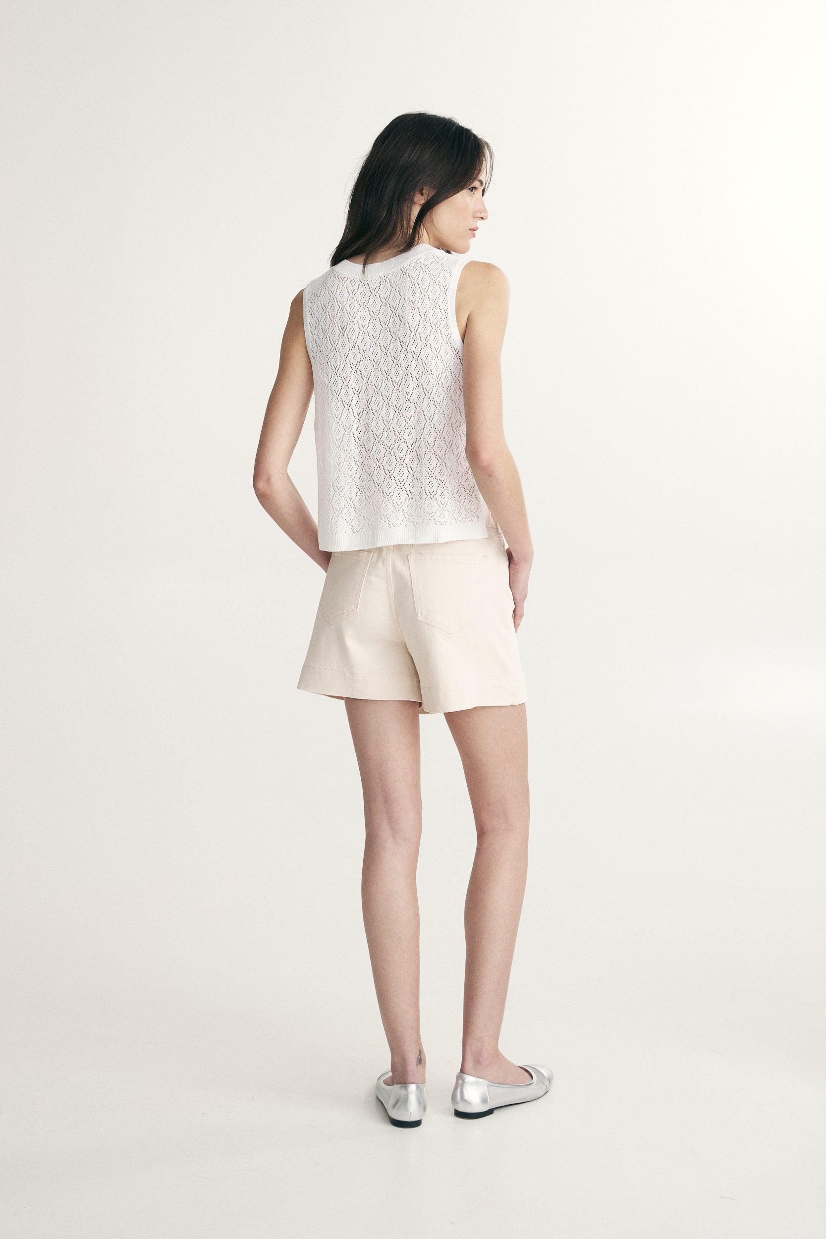 Cropped sleeveless sweater