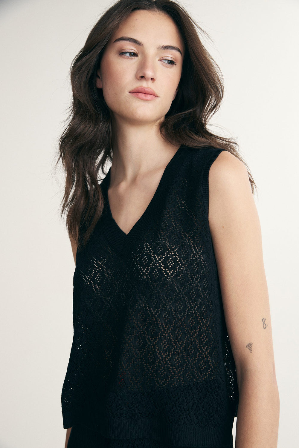 Cropped sleeveless sweater