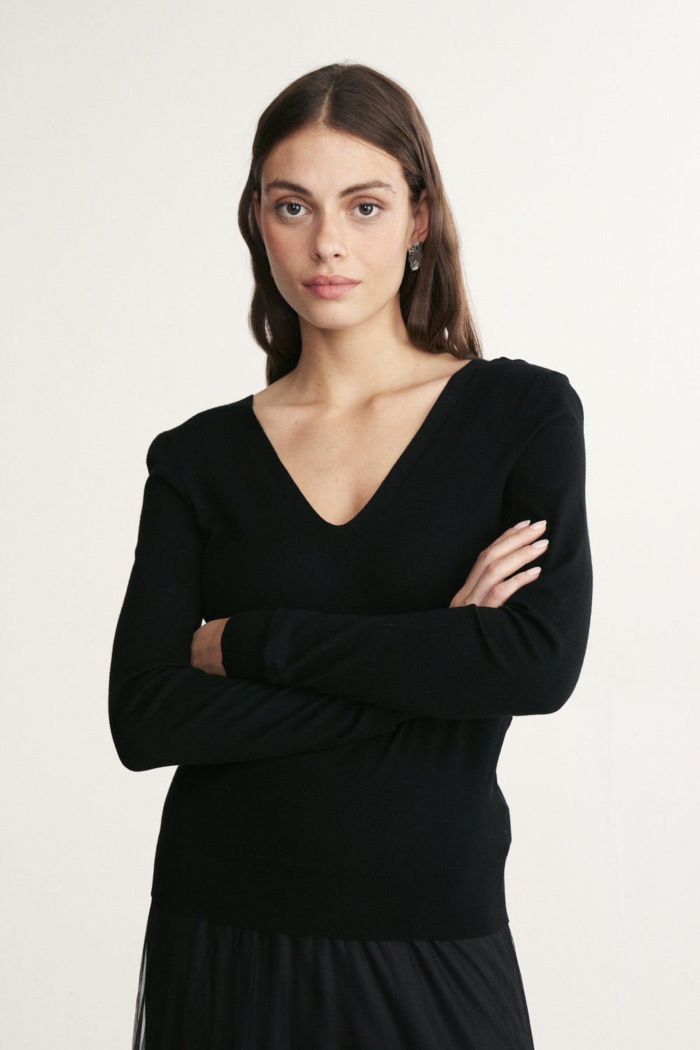 Pull à dos ouvert et col en V