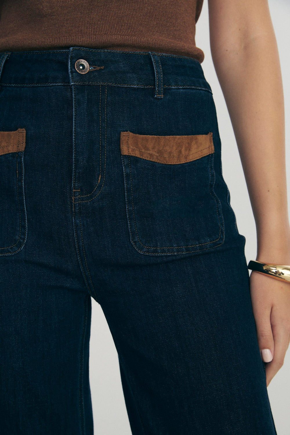 Jeans with faux suede details