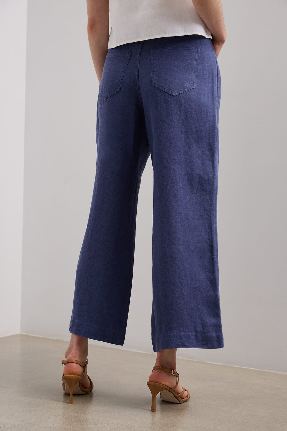 Pantalon en lin écourté jambe large à taille haute