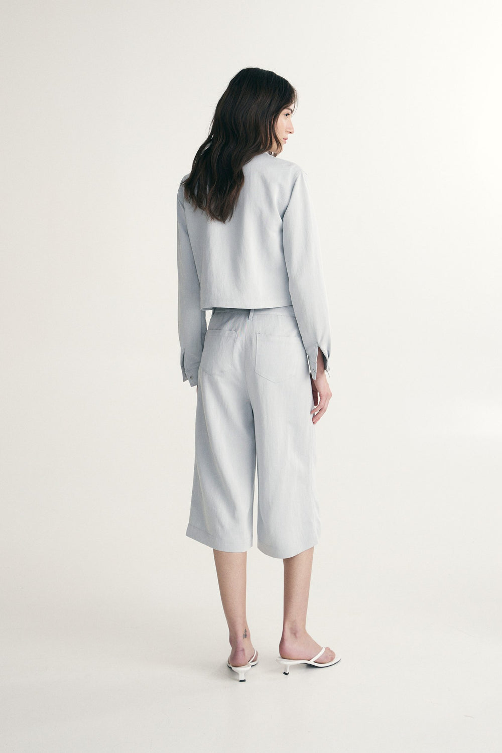 Pantalon écourté jambe large à taille haute
