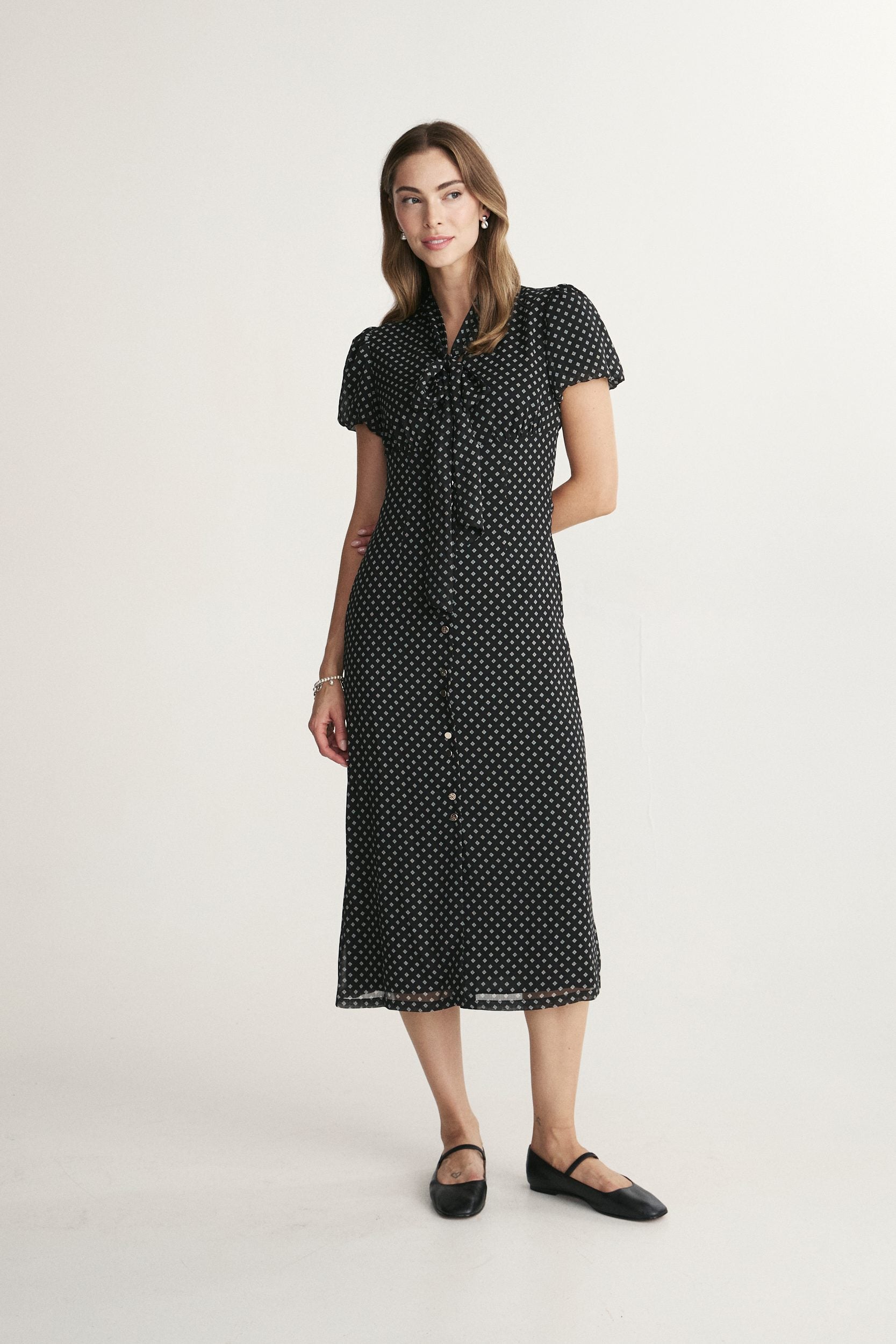 Robe à nœud sur le devant