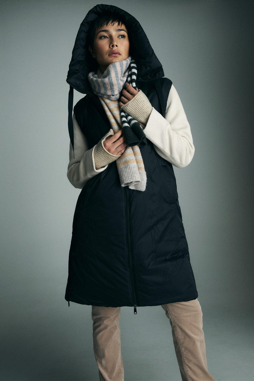 Manteau matelassé sans manche à capuche